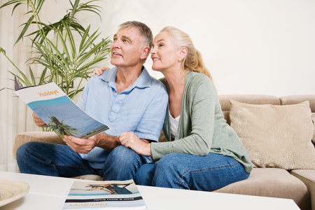 Mature couple planning a holidayの写真素材
