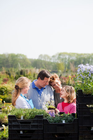 Family at garden centerの写真素材