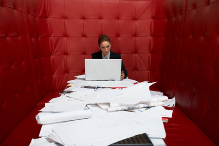 Businesswoman working at a tableの写真素材