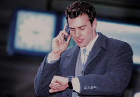 Businessman checking time