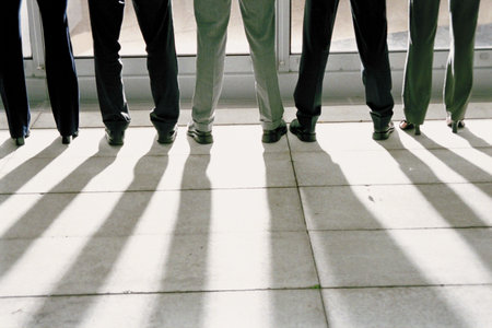 Businesspeople standing in a row