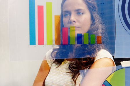 Young woman seen through graph.の写真素材
