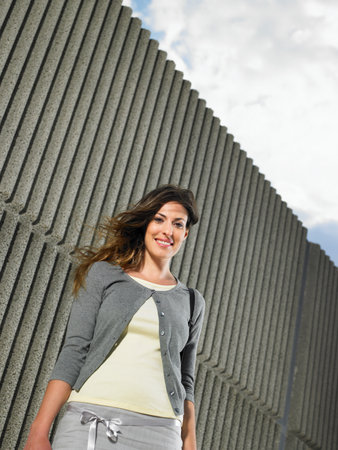 Low angle portrait of young womanの写真素材