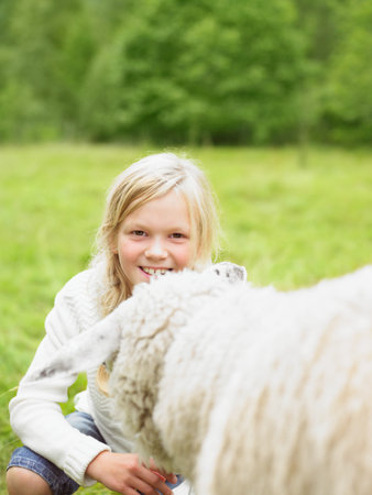 Young girl smiling and crouching
