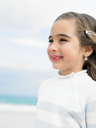 Girl on beach smiling close-upの写真素材