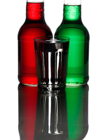 Bottles of liquid and glassの写真素材