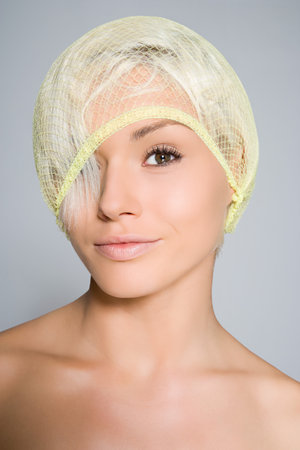 Portrait of a woman wearing a hairnetの写真素材