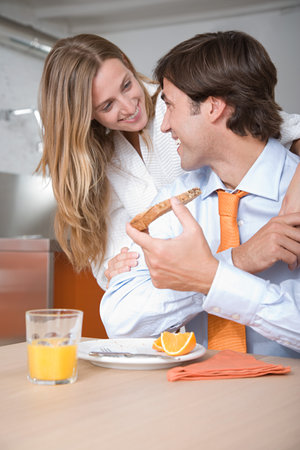 A couple at breakfastの写真素材