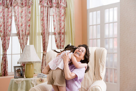 Happy woman with granddaughterの写真素材