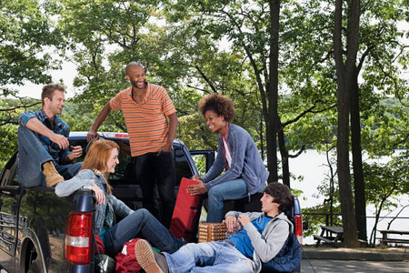 Friends in pickup truck