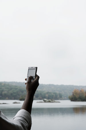 A businessman using a cell phone