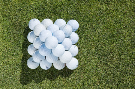 A stack of golf ballsの写真素材