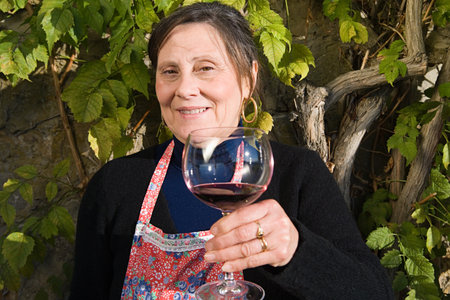 Italian woman drinking red wine