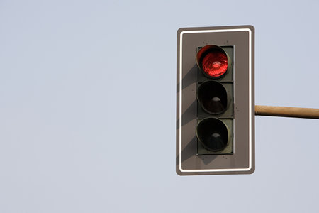 Traffic light on redの写真素材