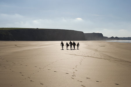 Surfers on a beachの写真素材