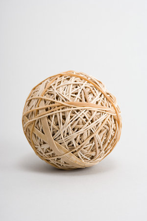 Rubber band ball on a white backgroundの写真素材