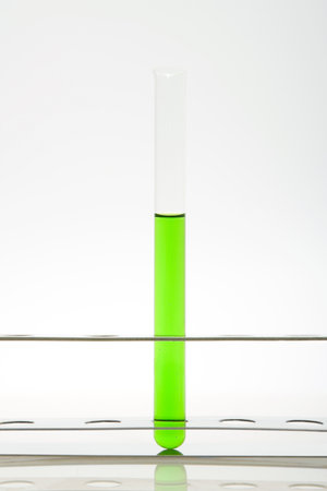 Green liquid in a test tubeの写真素材