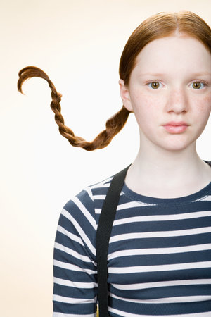 Portrait of a girl with pigtailsの写真素材