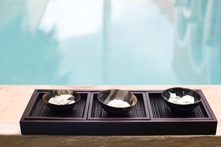 Bowls by swimming pool