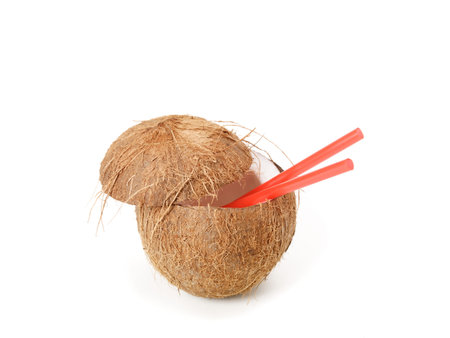A coconut cocktail on a white background