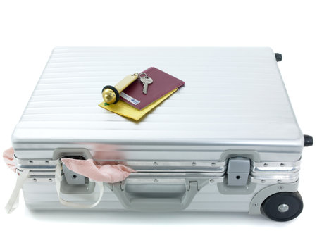 Suitcase passport and hotel keyの写真素材
