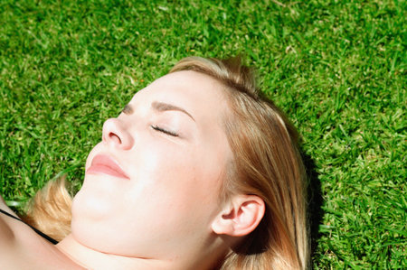 Woman sunbathingの写真素材