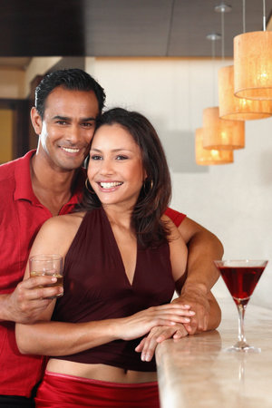 Smiling couple in barの写真素材