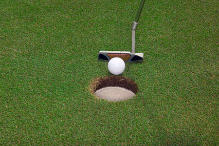 Golf ball and putterの写真素材
