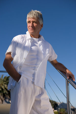 Mature man in whiteの写真素材