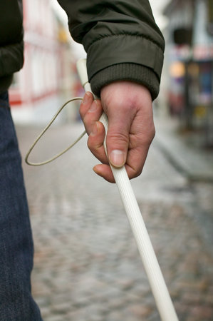 Blind man using a caneの写真素材
