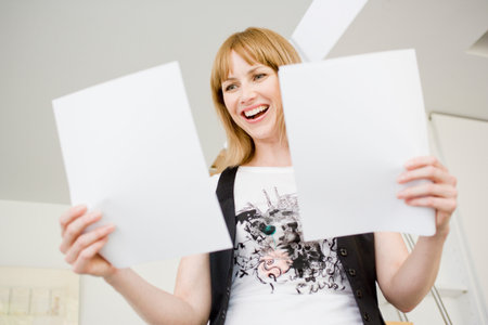 Businesswoman Studying Papersの写真素材