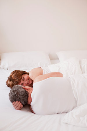 Eldery Couple Embracing And Smilingの写真素材