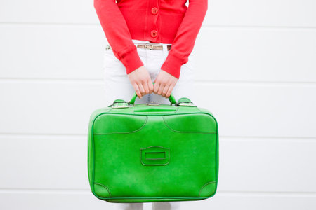 Girl Holding Suitcaseの写真素材