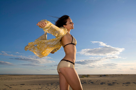 Carefree Young Woman At Beachの写真素材
