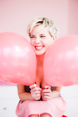 Girl Playing With Balloonsの写真素材