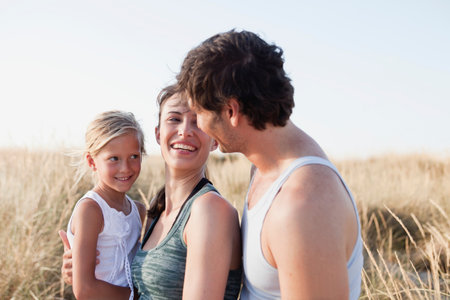 Family Smiling At The Beachの写真素材