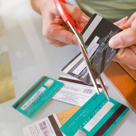 Woman Cutting Credit Cards