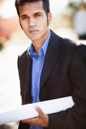 Man With Blueprints Outsideの写真素材