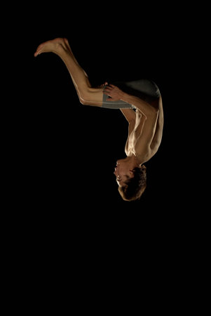Gymnast Upside Down In Mid Tumbleの写真素材