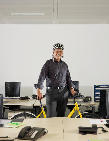 Portrait Of A Man With A Bicycleの写真素材