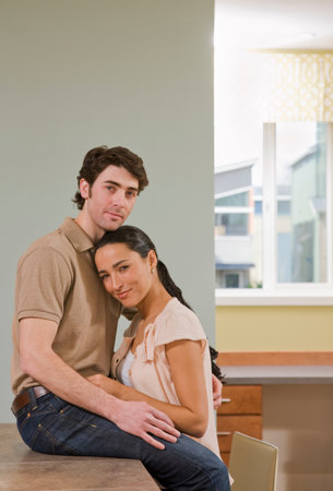 Couple Talking In Kitchenの写真素材