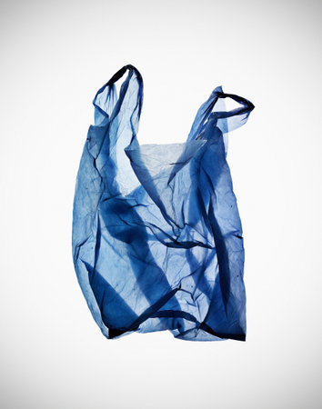 Crumpled Blue Plastic Bag On Tableの写真素材