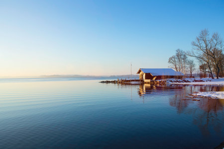 Snowy Landscape And Still Rural Lakeの写真素材