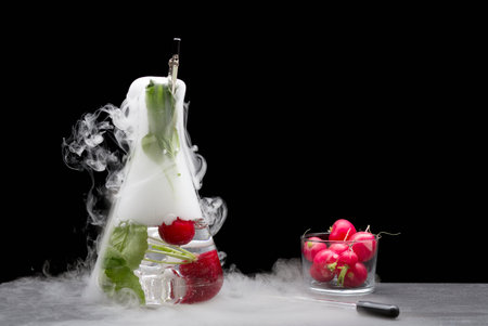 Tomatoes With Fruit In Smoking Beakerの写真素材