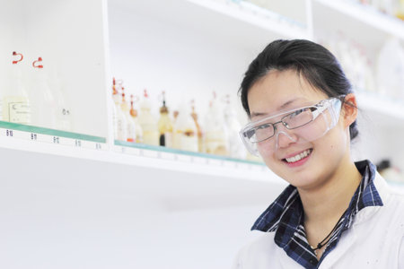 Scientist Wearing Goggles Over Glassesの写真素材