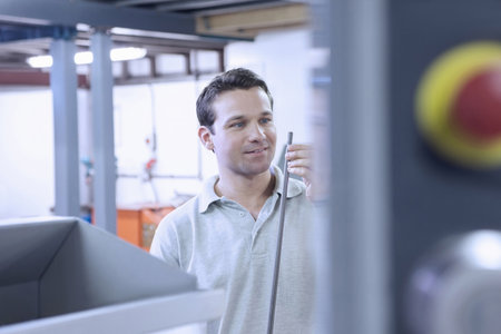 Engineer Working In Cnc Engineering, Production And Quality Control