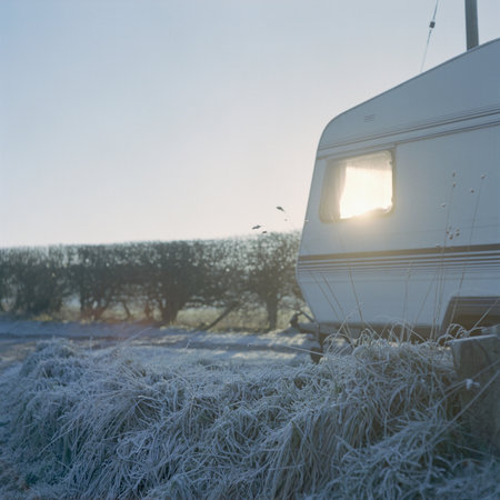 Caravan With Sunlit Window On Frosty Morningの写真素材