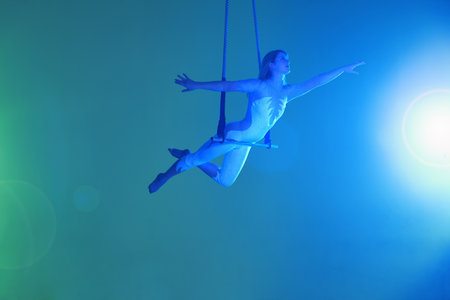 Young Woman On Trapezeの写真素材