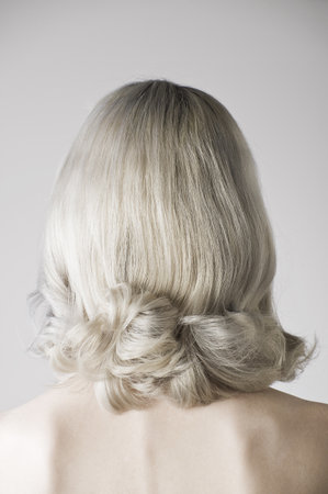 Studio Portrait Of Mature Woman Rear Viewの写真素材