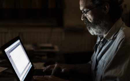 Mature Man Using Laptopの写真素材